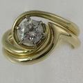 Fitted gold wedding ring and engagement ring