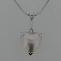 Heart shaped cultured pearl necklace in silver