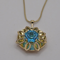 Swiss blue topaz and 9ct yellow gold necklace