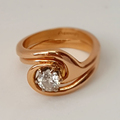 Rose gold and diamond engagement ring with fitting wedding ring