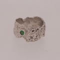 Reticulated silver with a bezel mounted tsavorite stone