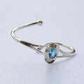 Silver and blue topaz bangle