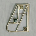 Linear white gold brooch