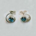 Silver and blue topaz stud earrings
