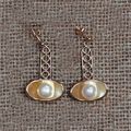 Reflective pan pearl earrings