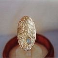 Cuttle fish textured opal brooch