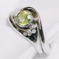 Bespoke peridot engagment ring and fitted wedding ring