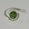 Silver and peridot flowing ring